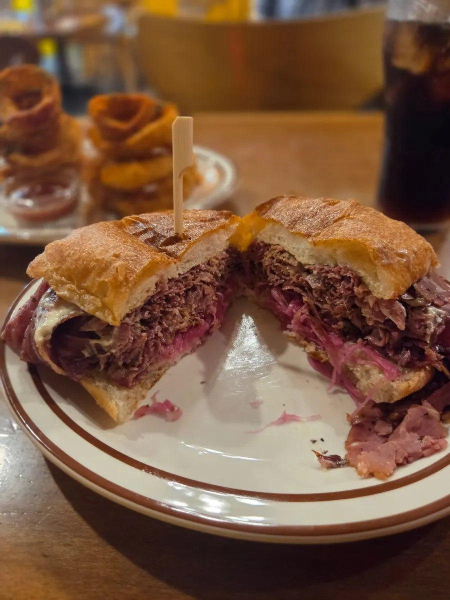 Inside the sandwich, packed with brisket pastrami