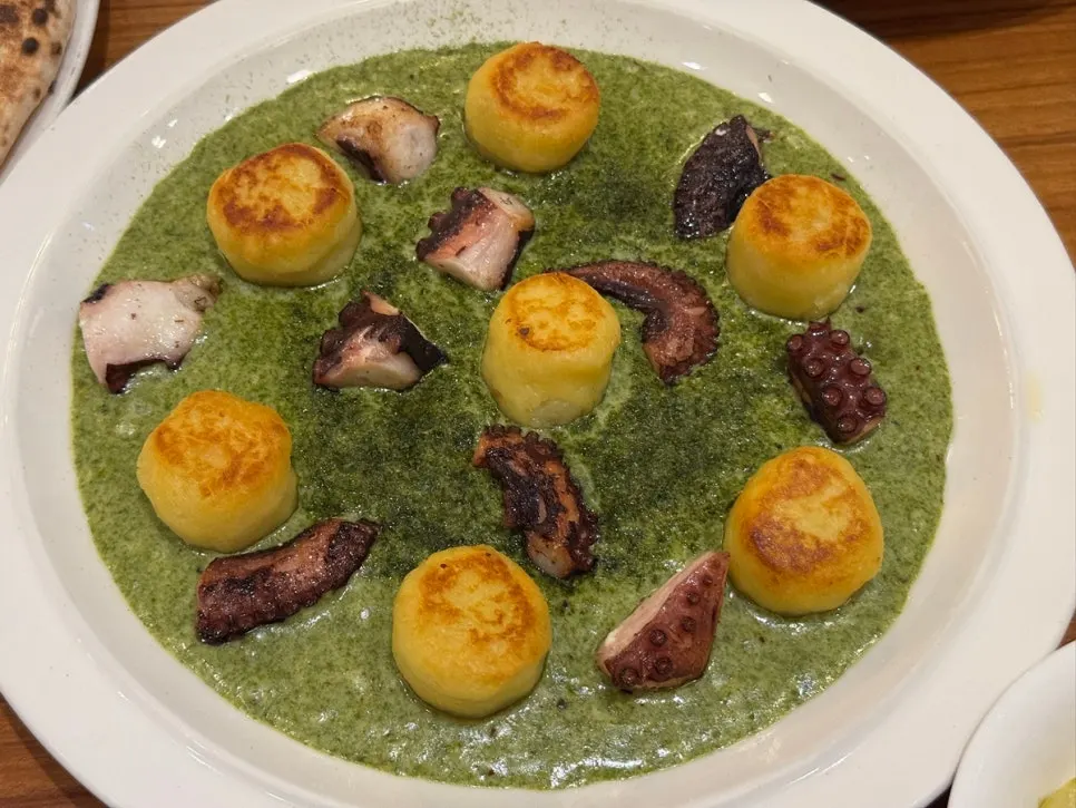 Octopus gnocchi in green cream sauce
