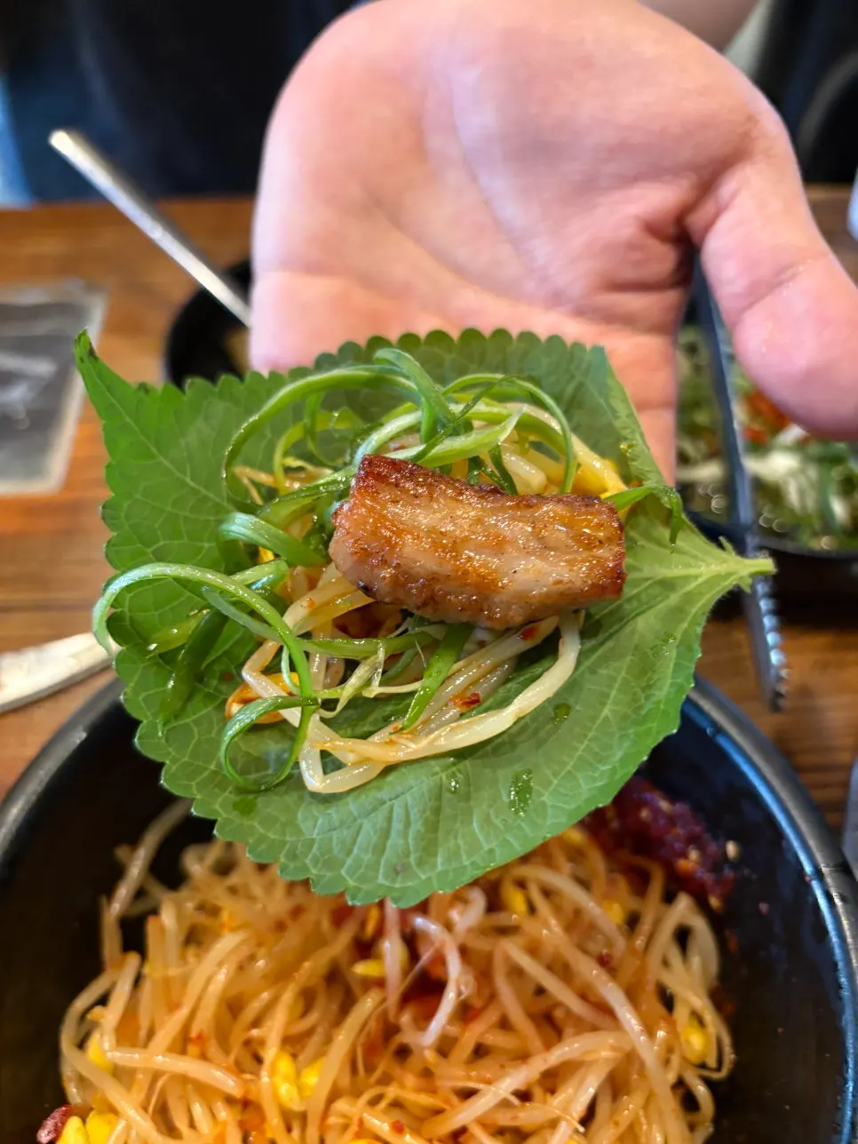 Charcoal-seared pork belly spread at Migang Sikdang in Jamsil