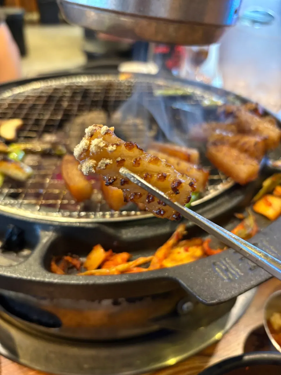 Pork belly skin grilling on the grill
