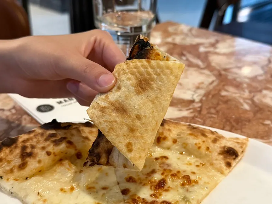 Whole Camembert cheese pizza