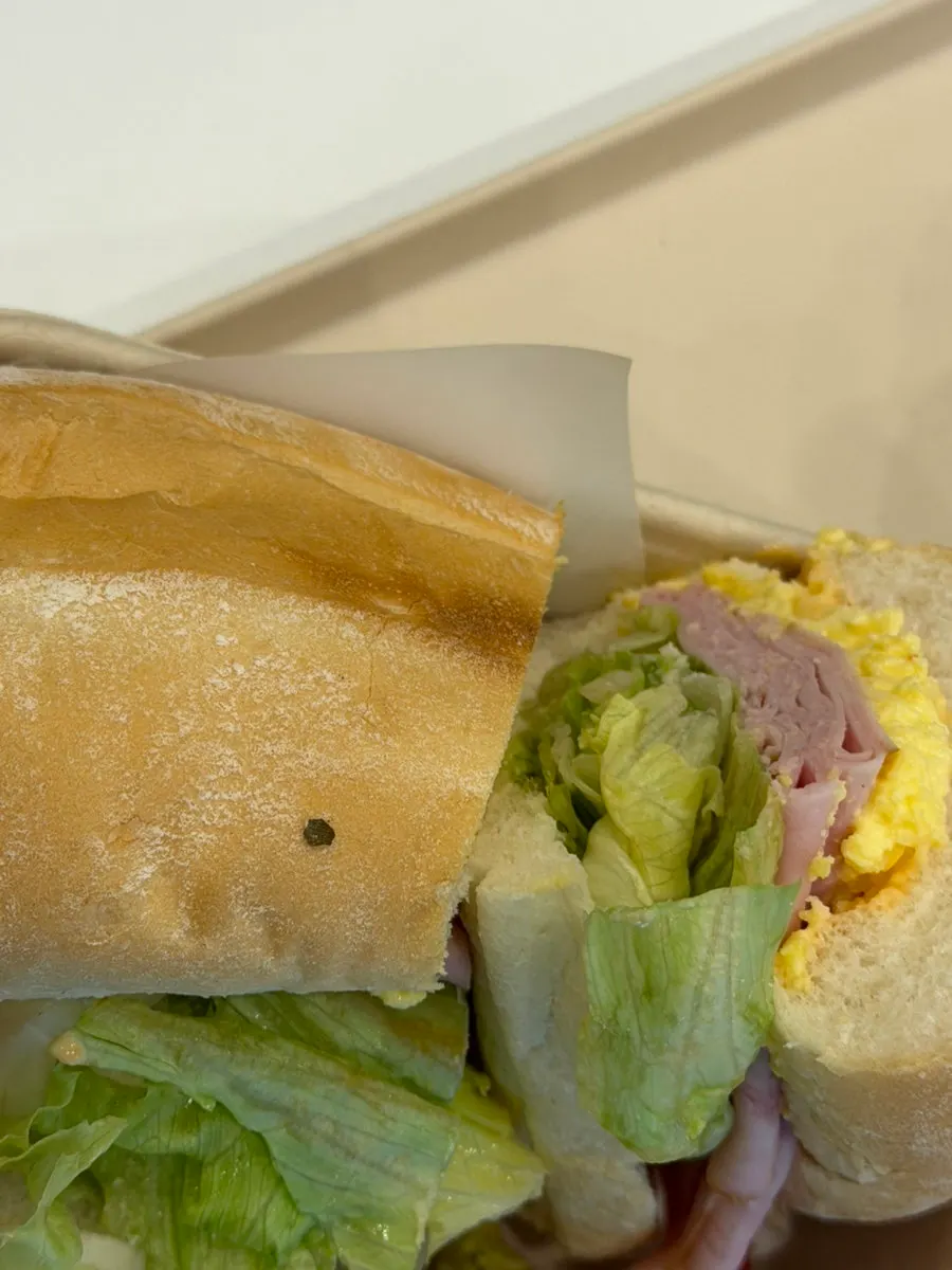 Town Sandwich cut in half after being thickened with extra egg mayo
