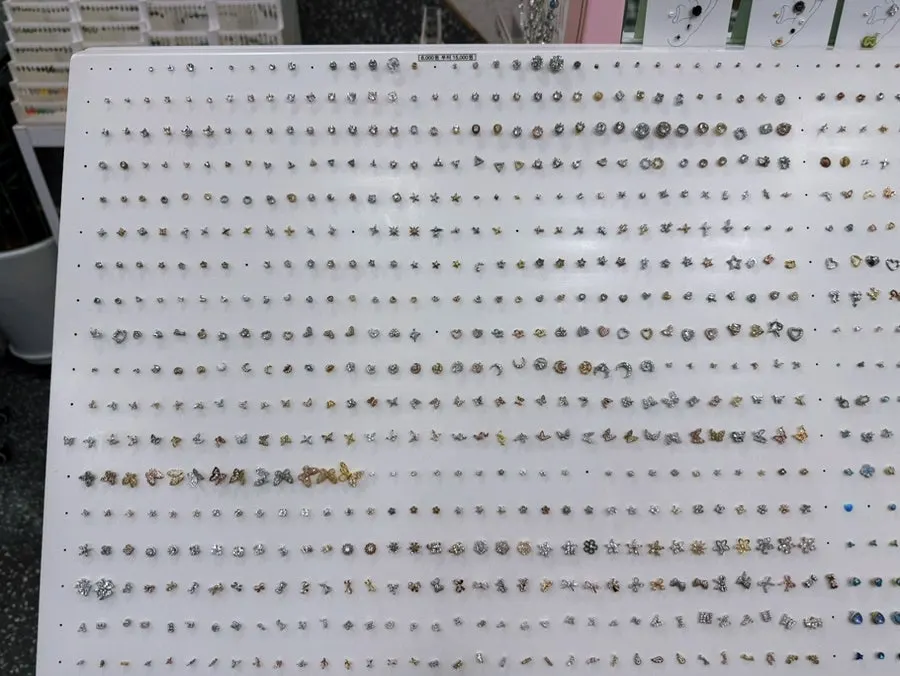 14k, silver, and surgical-steel piercings