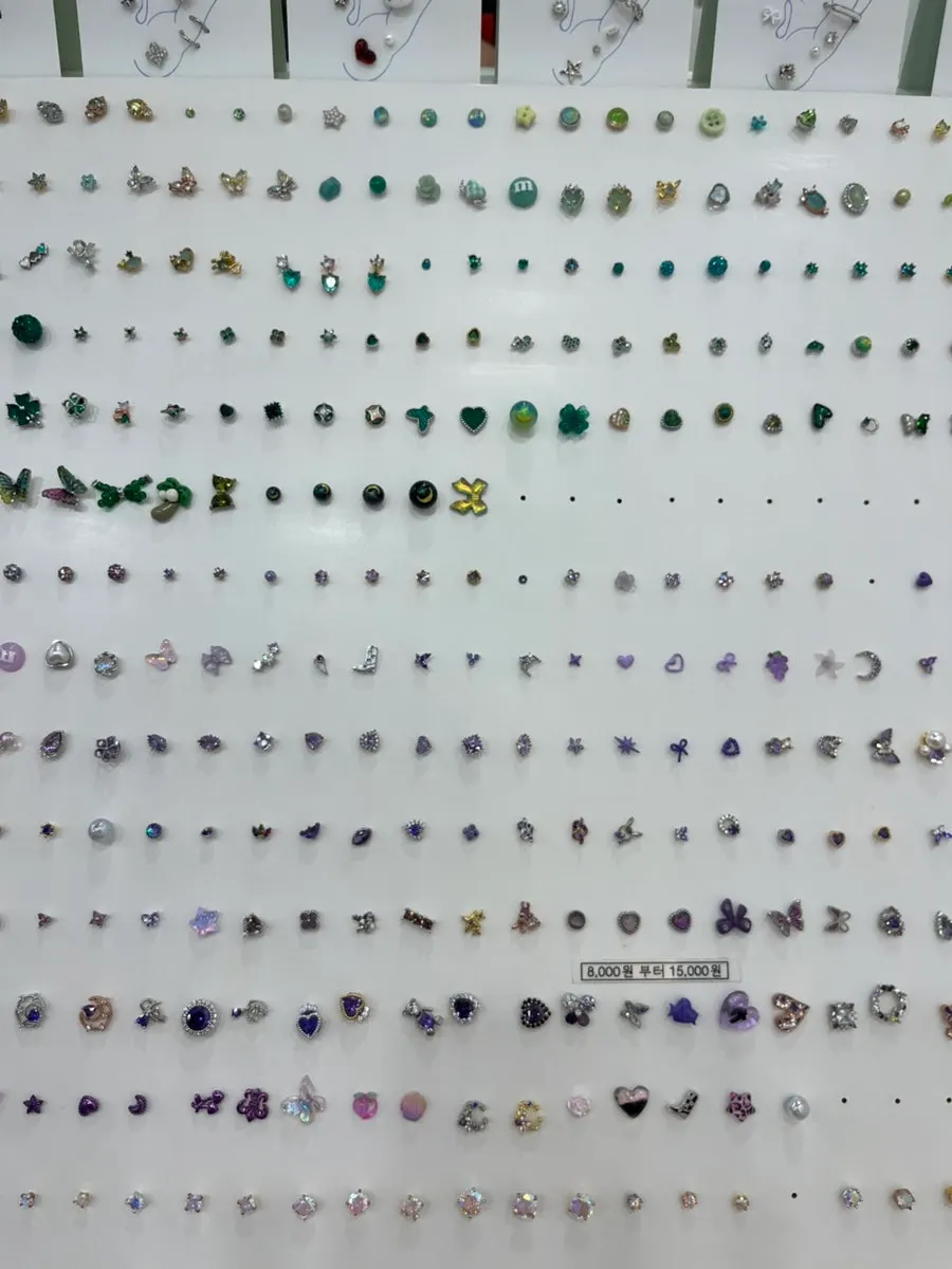Piercing display grouping similar designs together