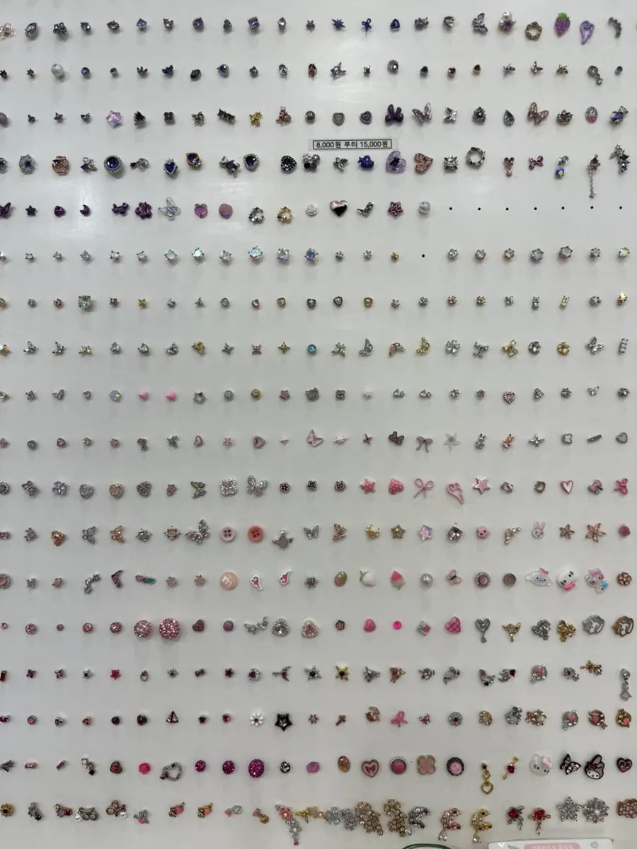 Various surgical steel piercings on display