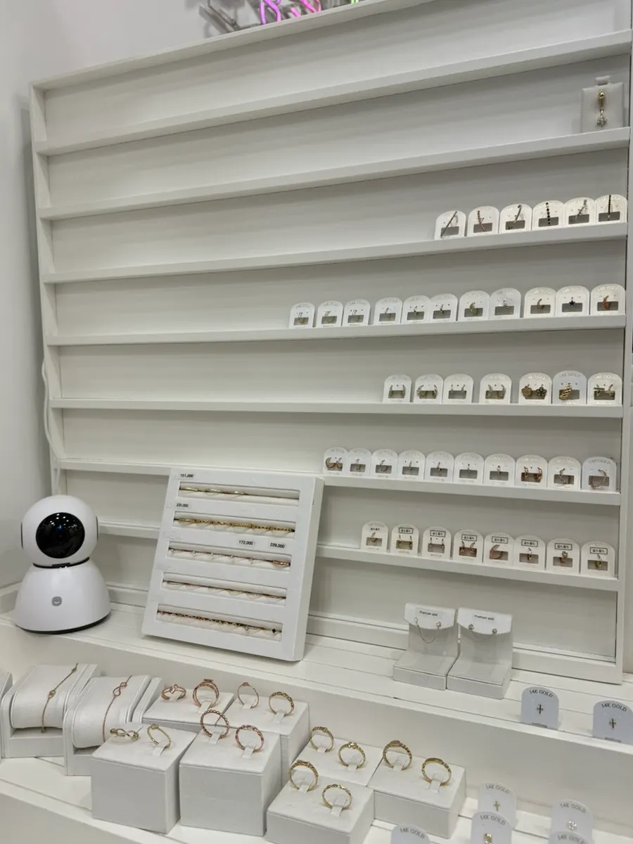 Ring corner displayed alongside earrings