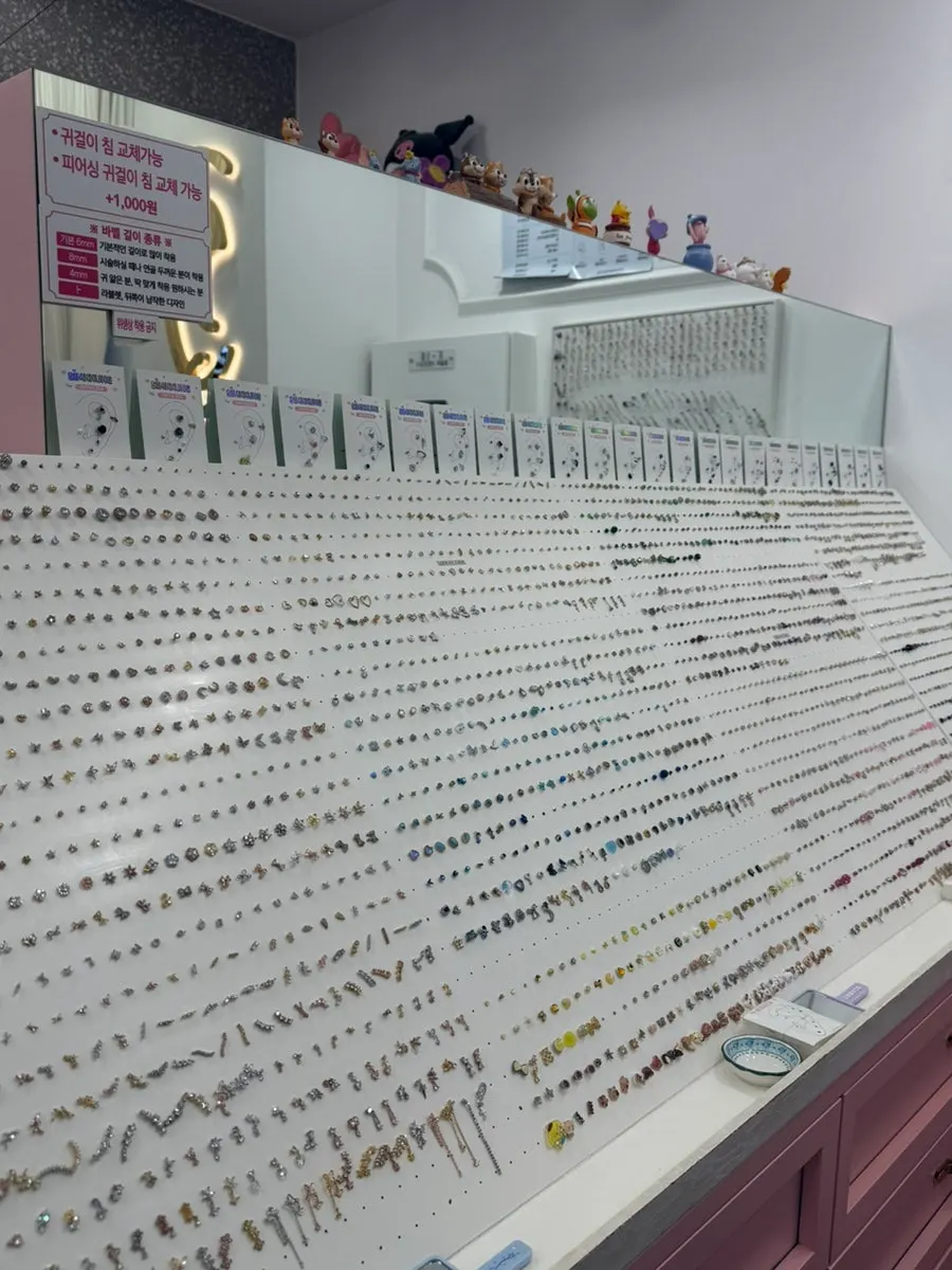 Necklaces with a string-and-pebble look on display
