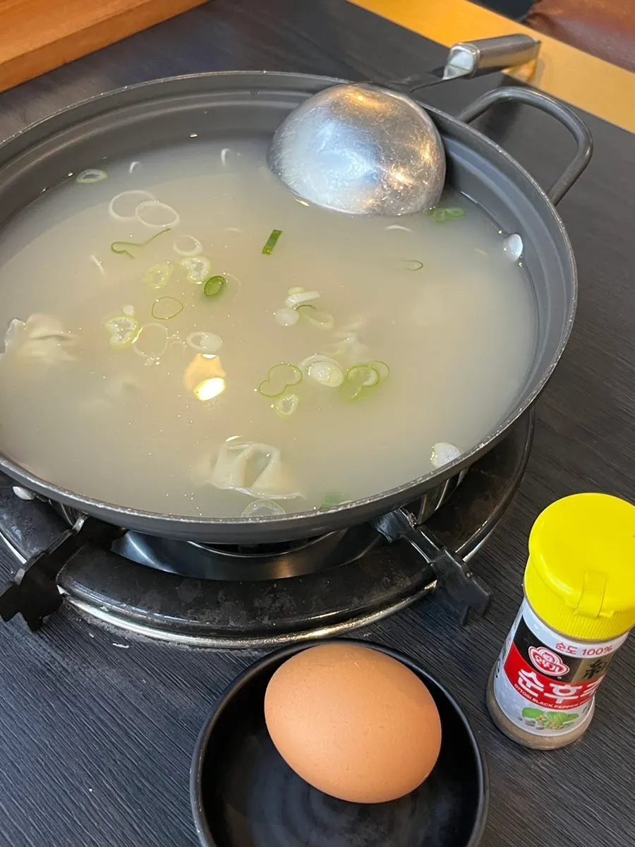 Free rice cake dumpling soup served as a base dish