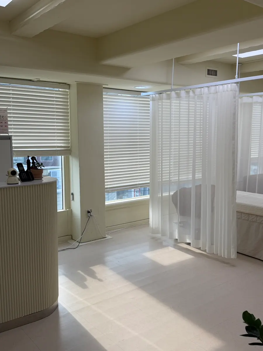 Ivory and cream-toned interior of Rose Lash