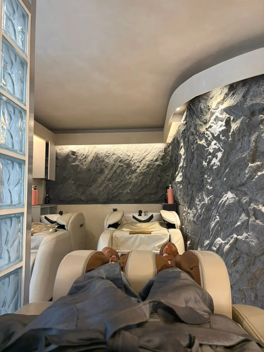 Scalp scaling being done in the shampoo room