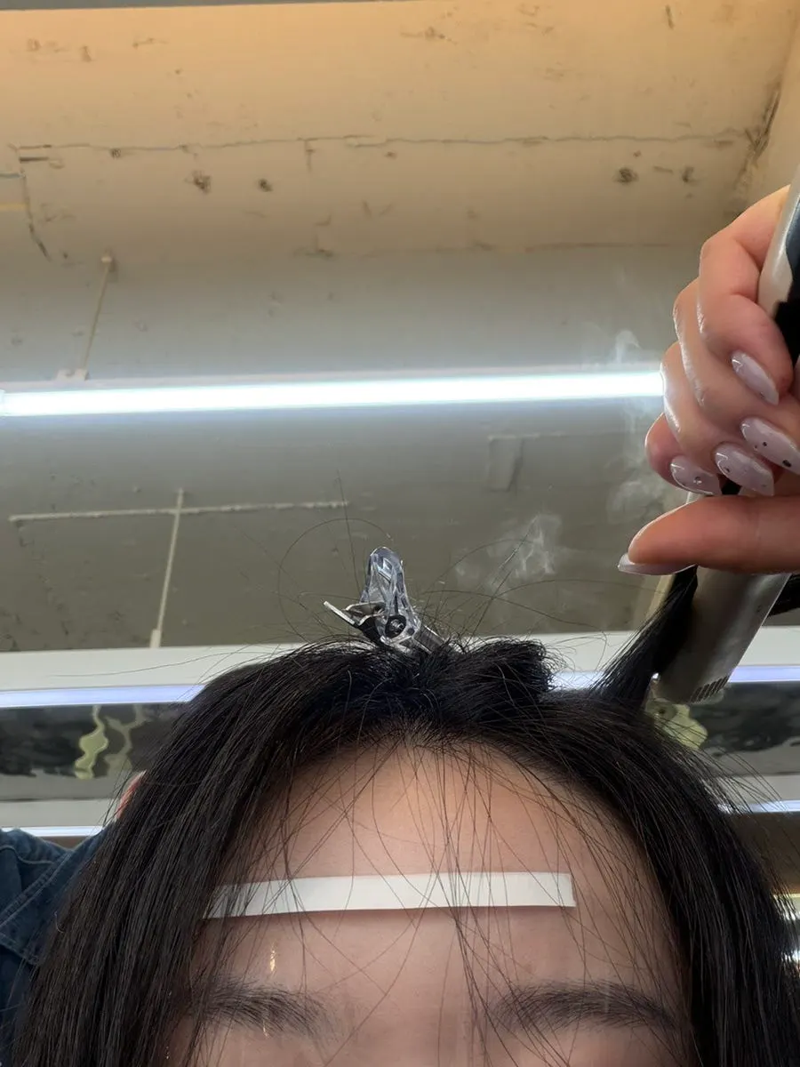 Hair during the root perm treatment