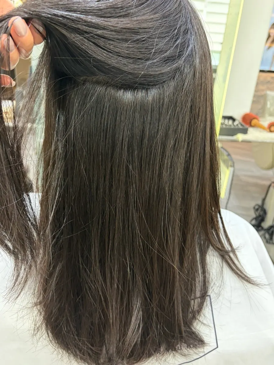 The inner hair straightened after the root perm
