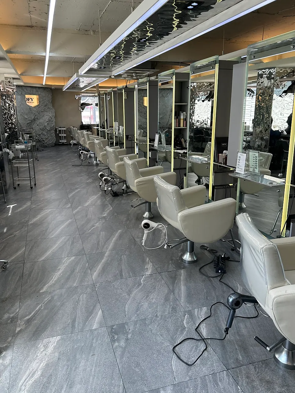 Interior of Only For You Jamsilsaenae Branch with gray-toned walls