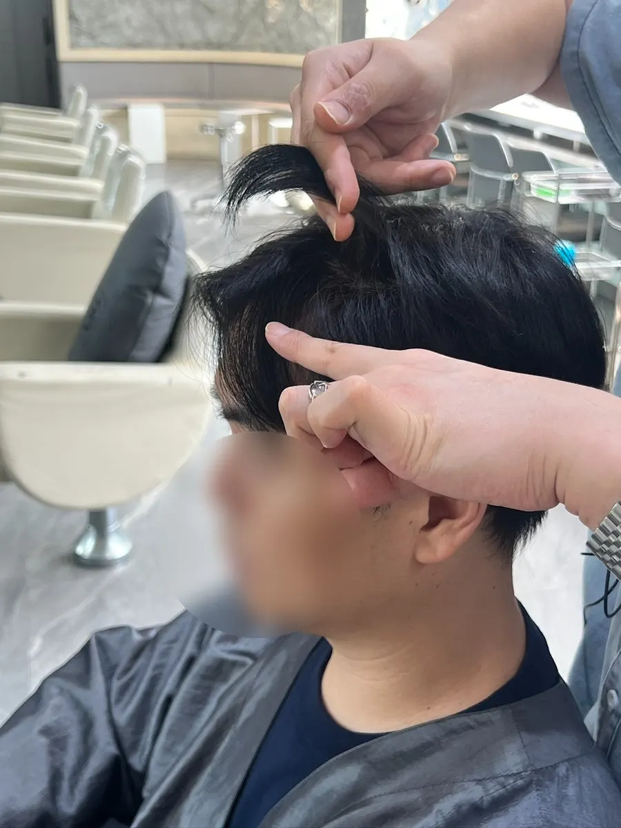 Before the cut, after deciding on the drop cut style