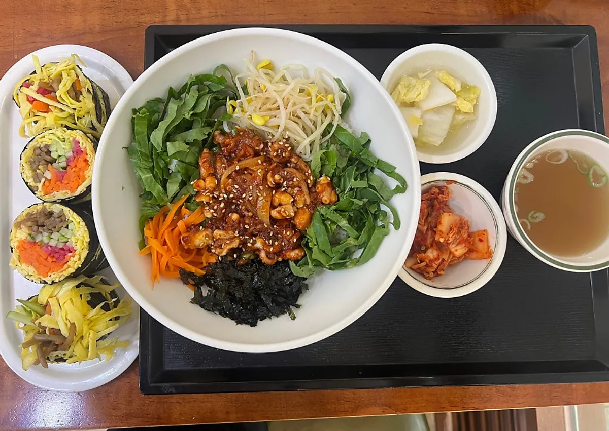 Octopus bibimbap topped with various ingredients at Jamsil Cheotjip