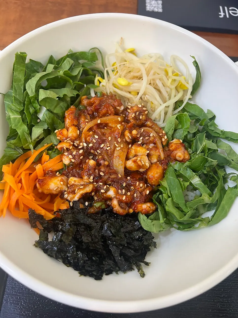 A plate of gimbap ordered alongside the octopus bibimbap
