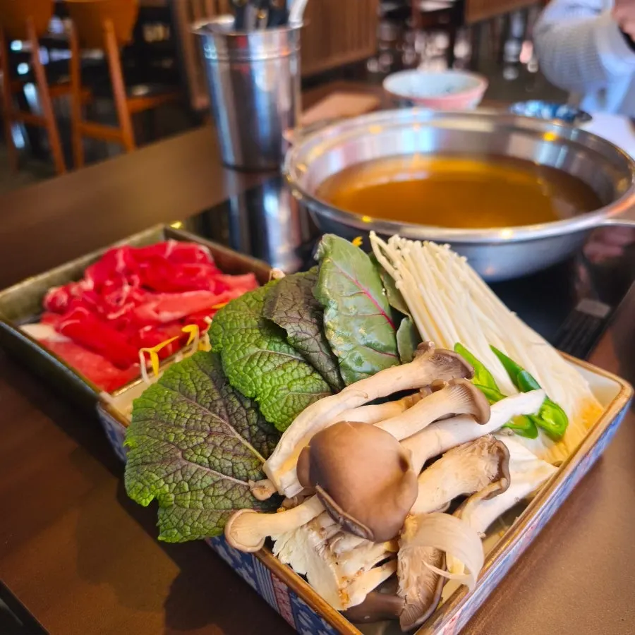 Beef shabu shabu broth full of beef and vegetables