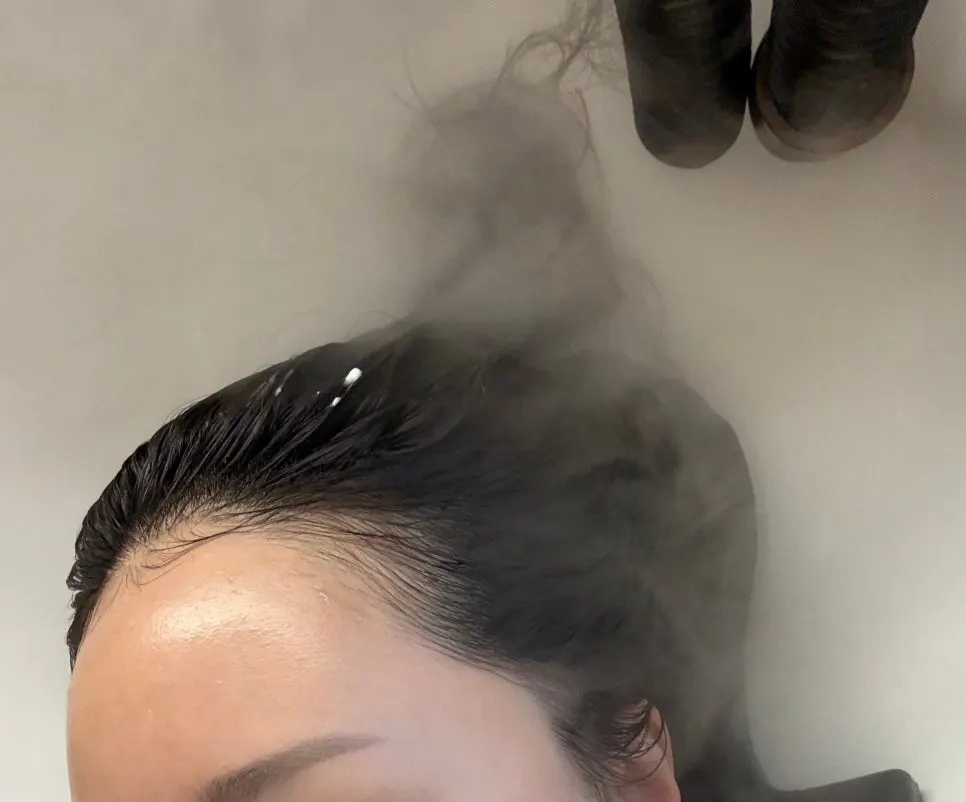Careful straightening of the root section during the root perm