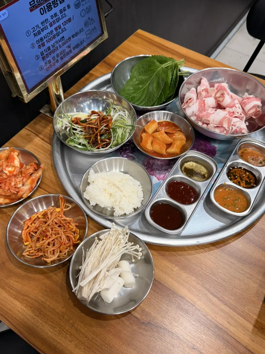 An armful of side dishes from the self-serve bar