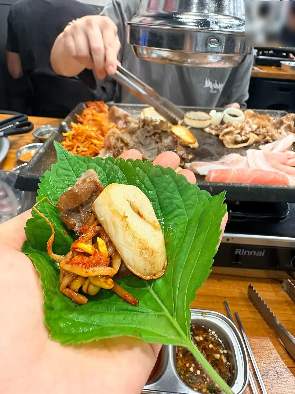 Meat set alongside wrap vegetables