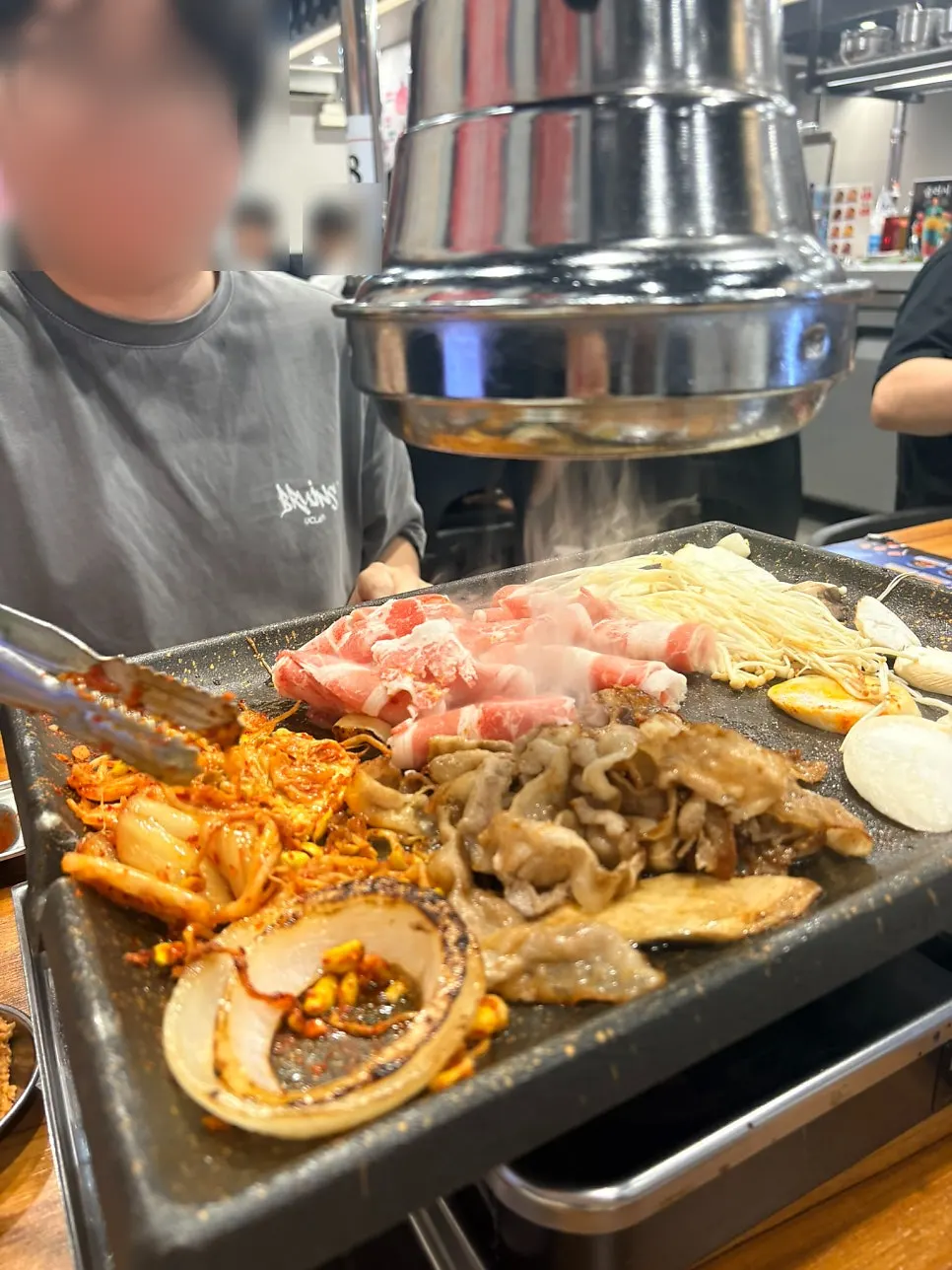 Meat grilling nonstop on the hot plate
