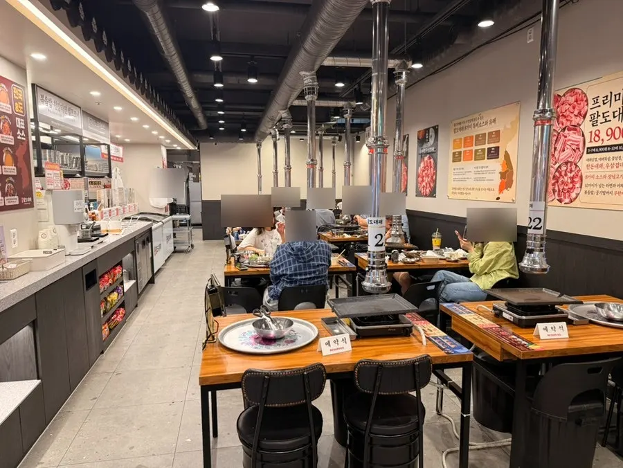 Nearly full seating area with customers