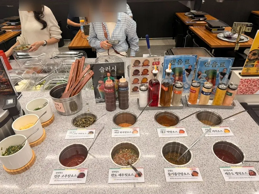 Self-serve bar filled with side dishes