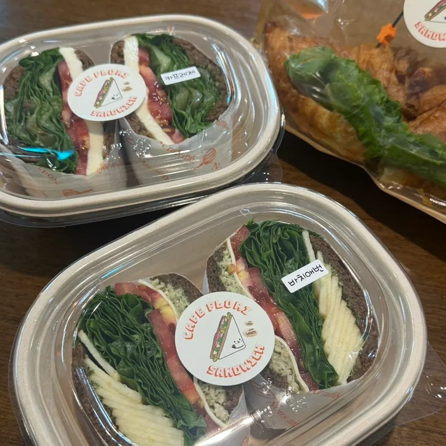 Sandwiches packed in paper containers for takeout