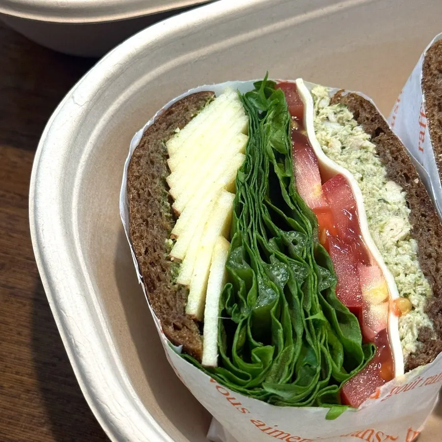Basil chicken apple bun packed thick with ingredients