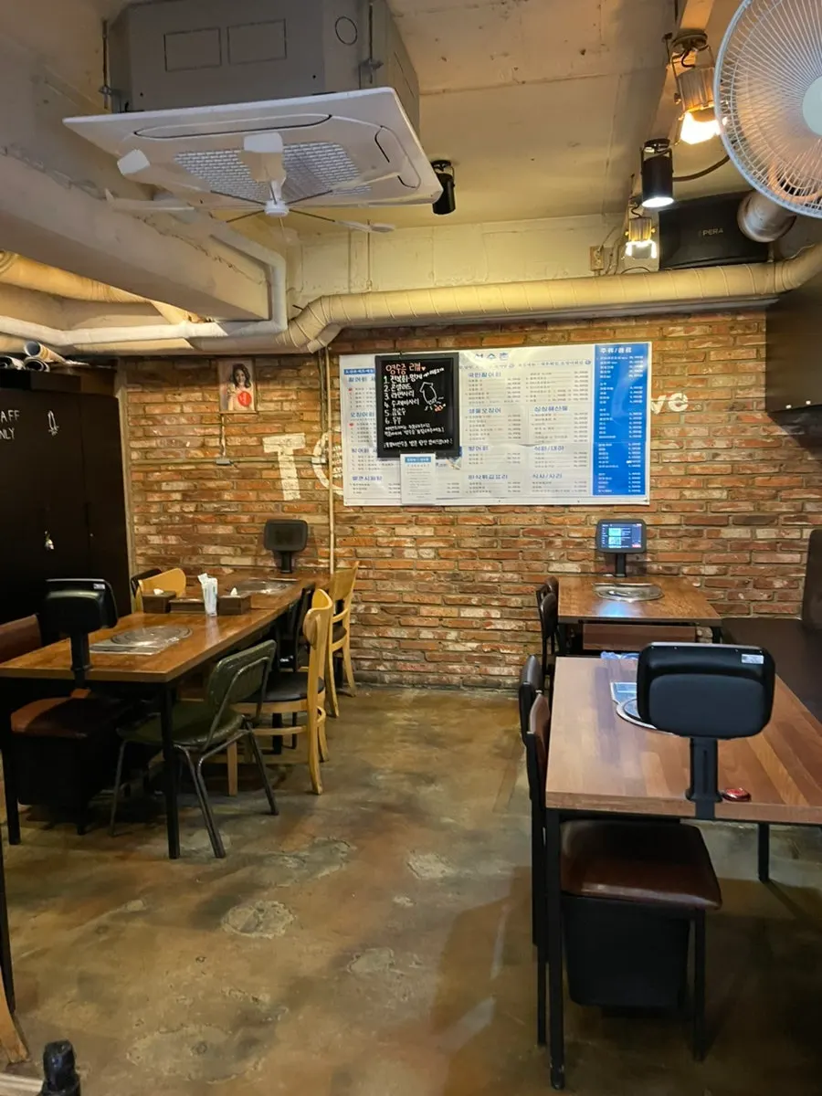 Room-like separated seating at the back of the restaurant