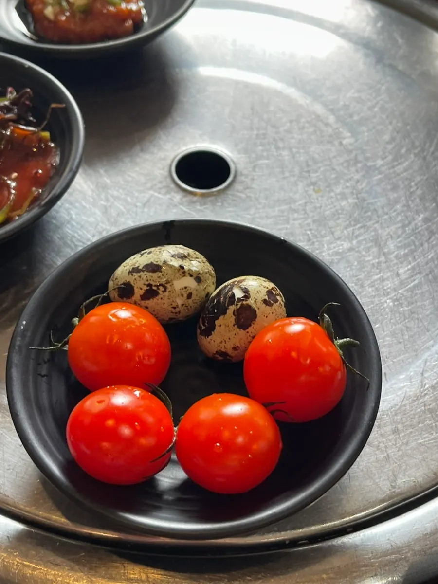 Quail eggs and cherry tomatoes as banchan