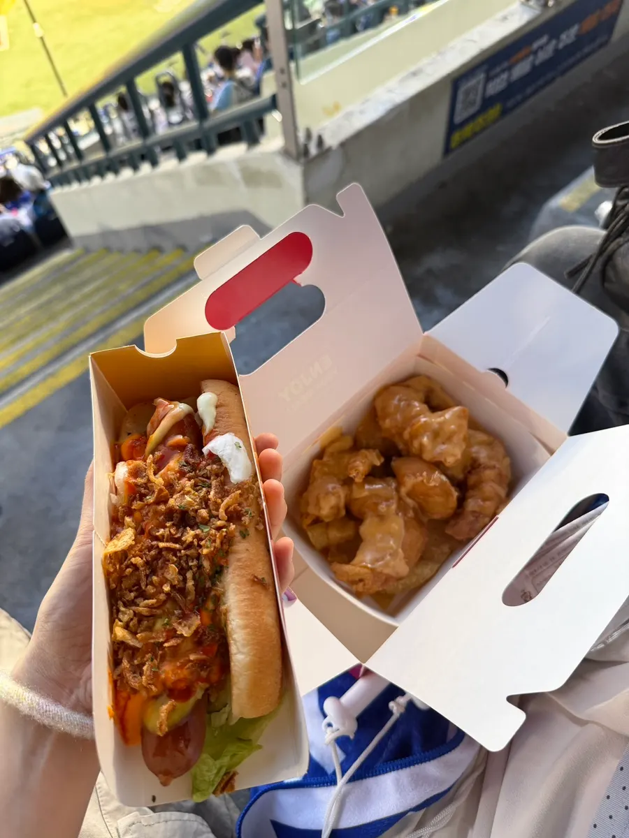 Cream shrimp and hot dog unboxed at the seat