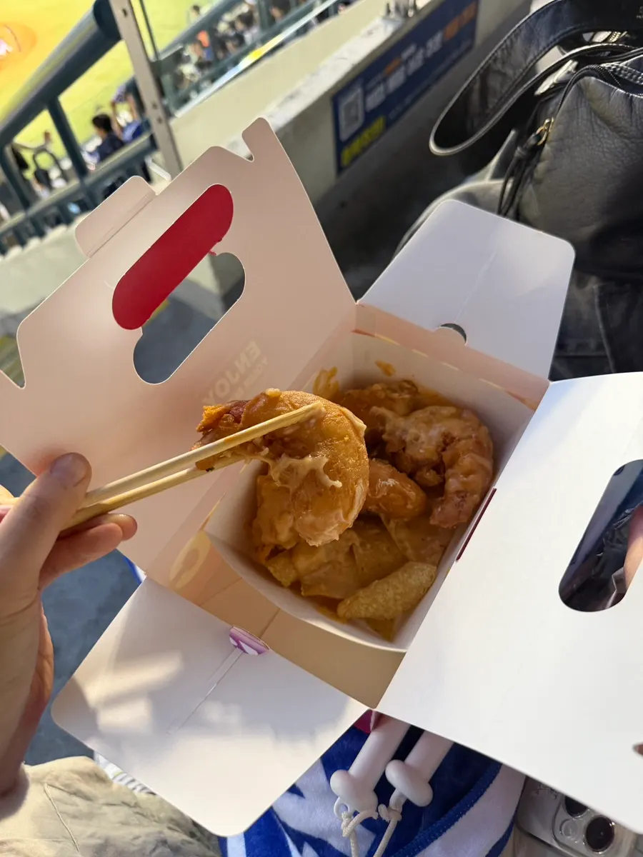 Close-up of thick fried shrimp in cream sauce