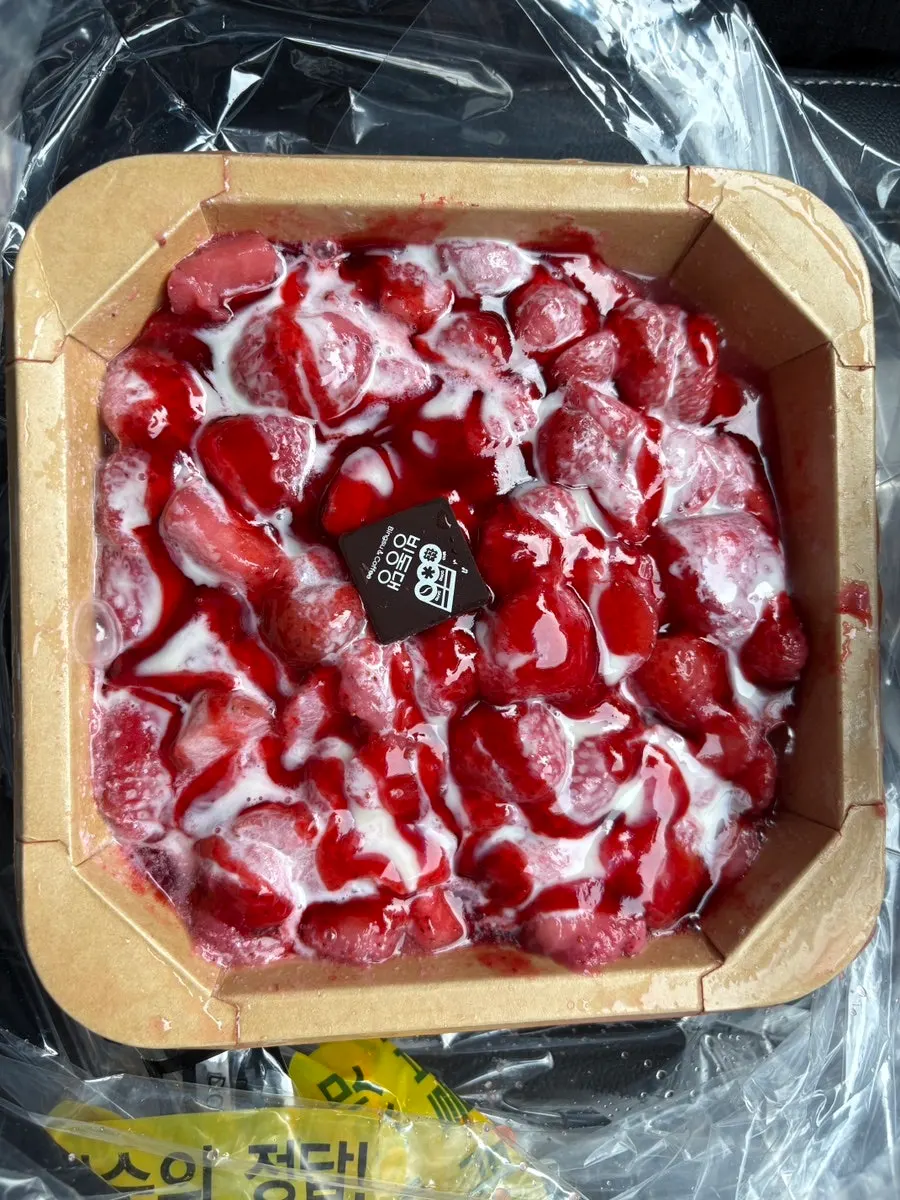 Bingdongdaeng strawberry bingsu in a takeout cup