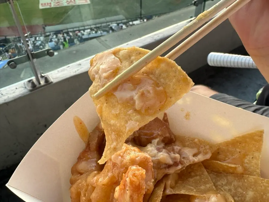 Crispy nacho chips underneath the cream shrimp