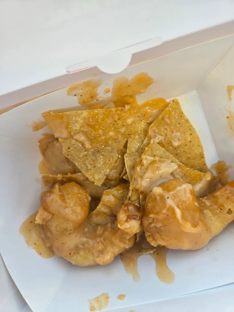 Eating the cream shrimp by hand in the seat