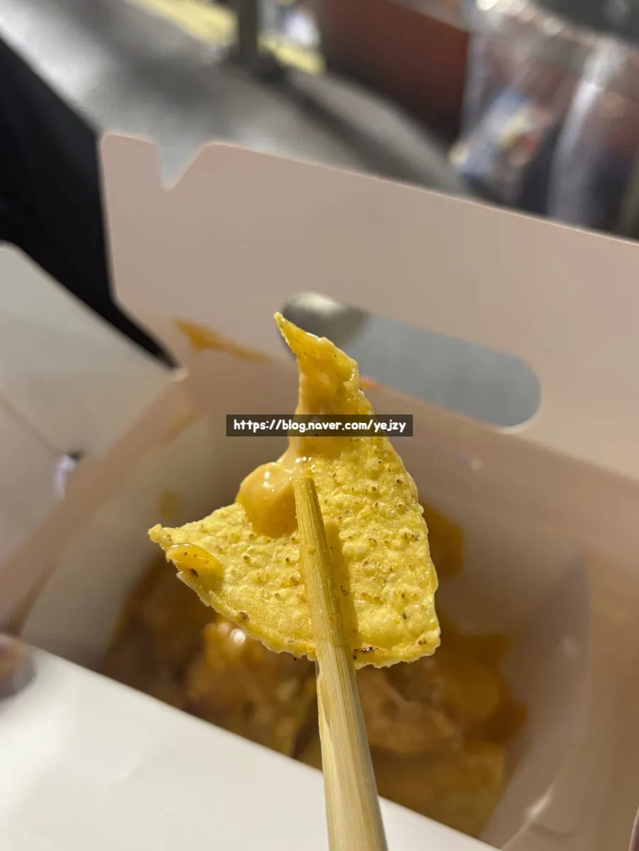Station nachos served with cream sauce