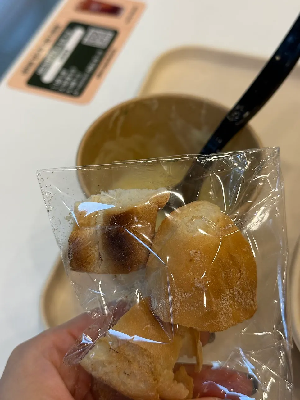 Baguette dipped into cream soup