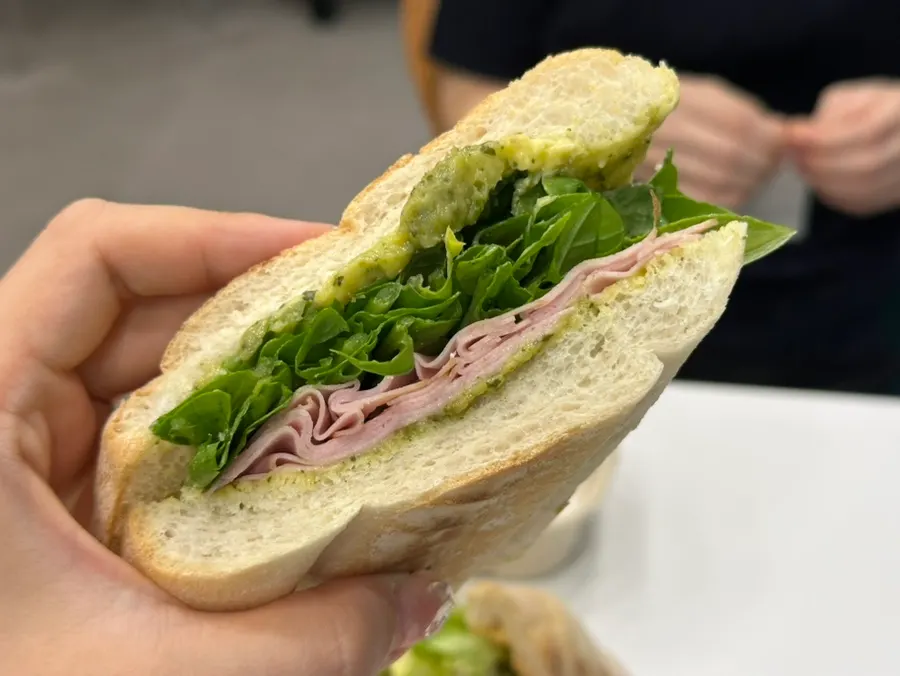 Cross-section of the basil jambon-beurre with rocket