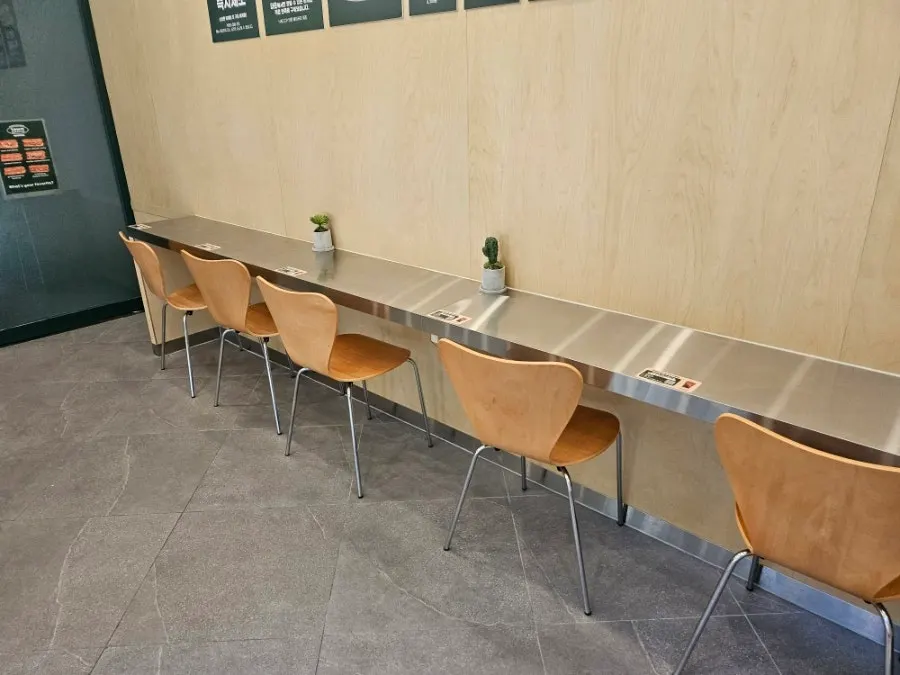 A corner of the shop set up with solo-dining seats