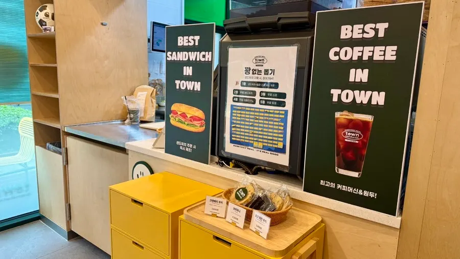 Menu board listing the various sandwich options