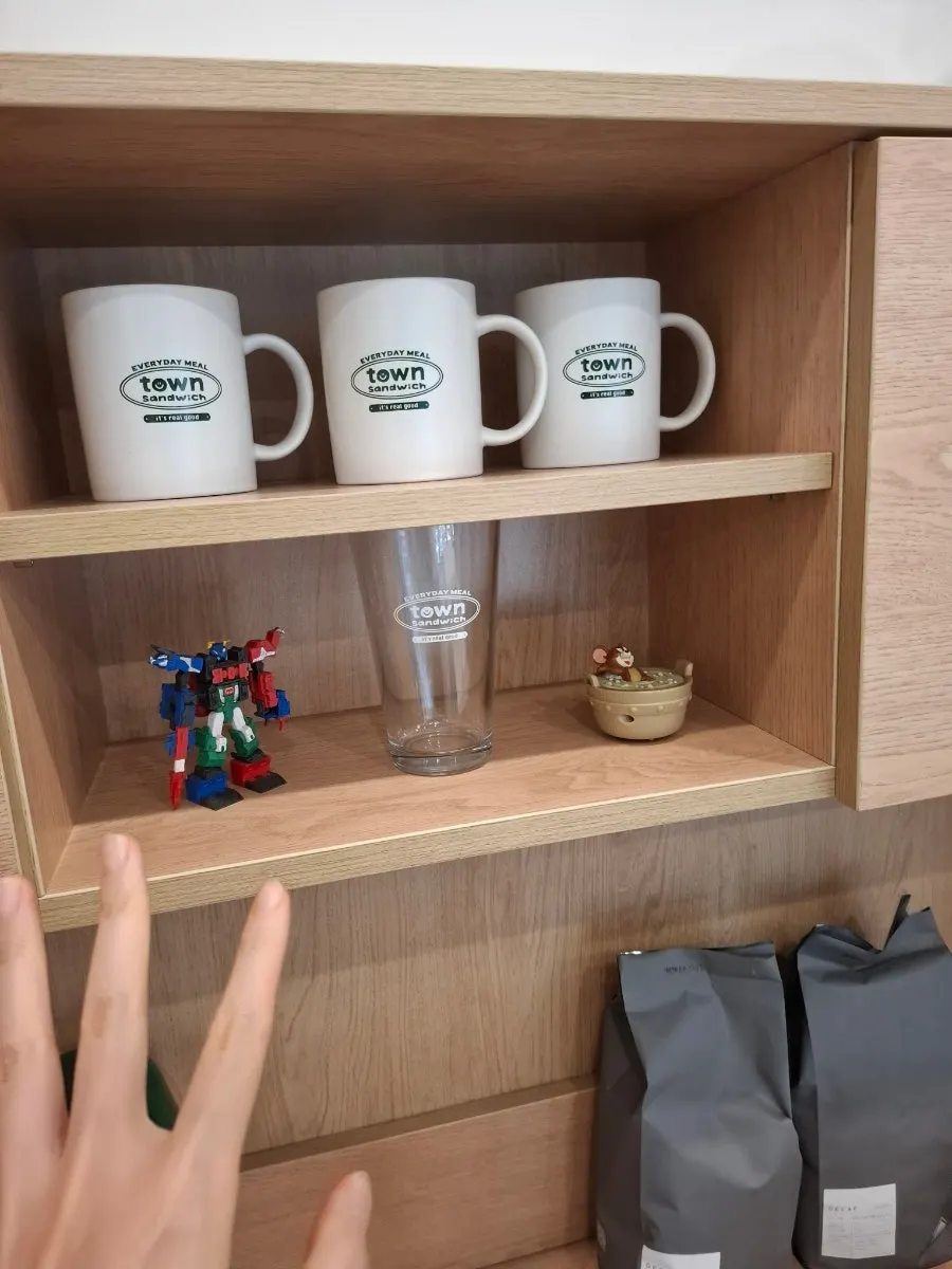 Self-serve bar with wet wipes, straws, and cups