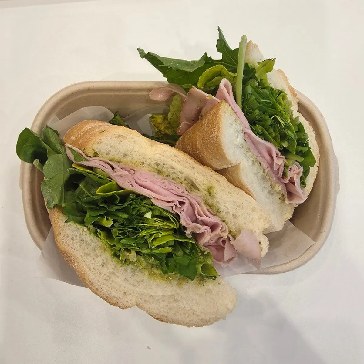 Basil jambon-beurre sandwich made with baguette