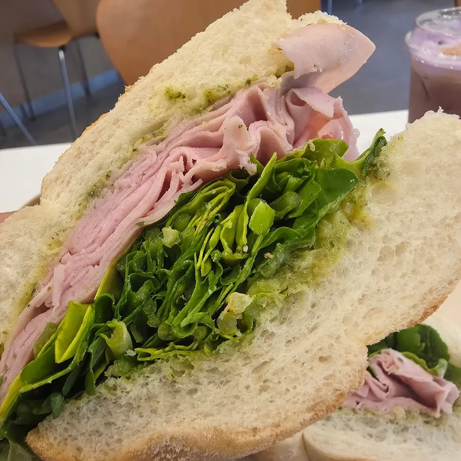 Cross-section of basil jambon-beurre showing the jambon