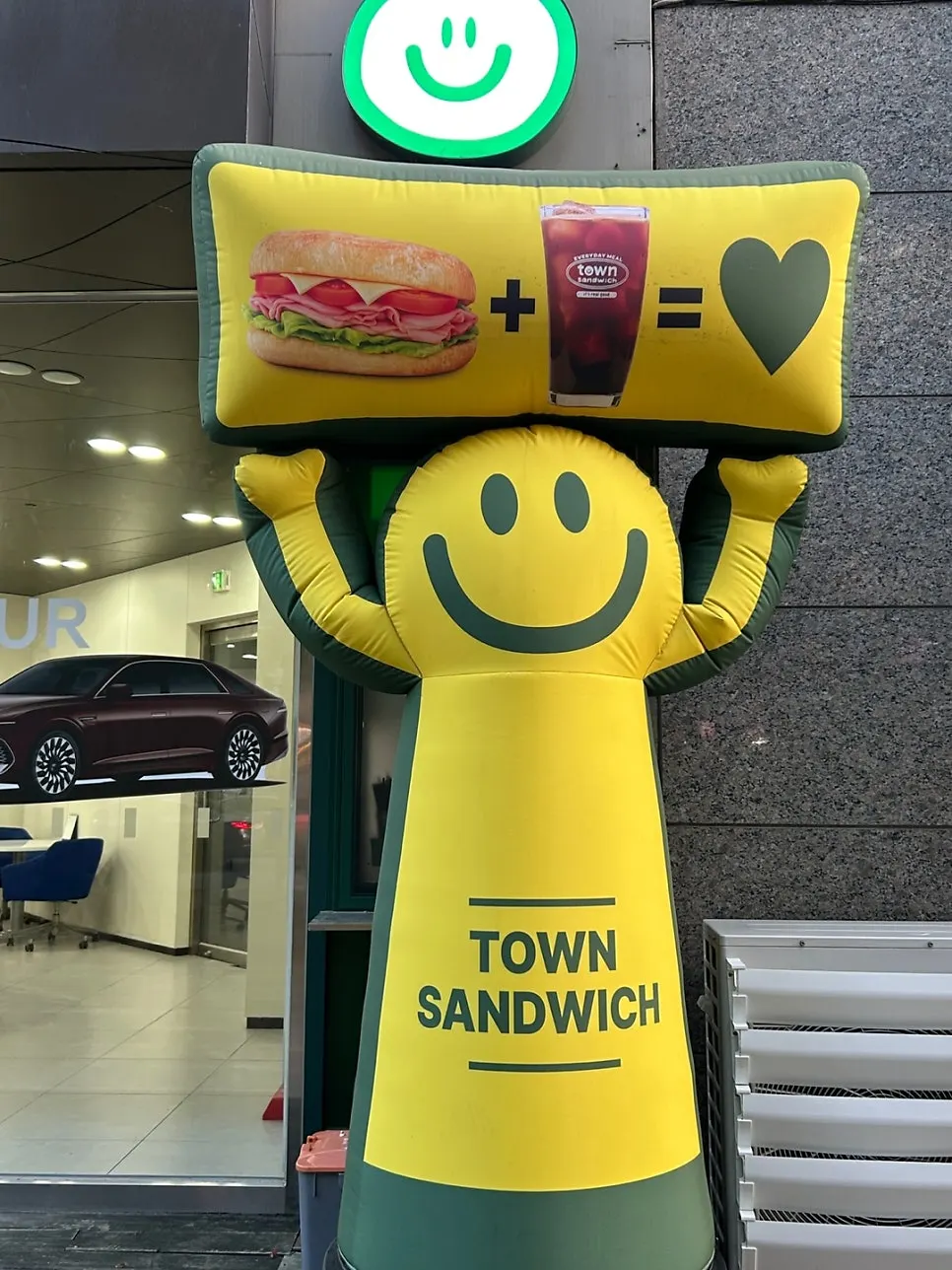 Green and yellow exterior of Town Sandwich Jamsil Branch
