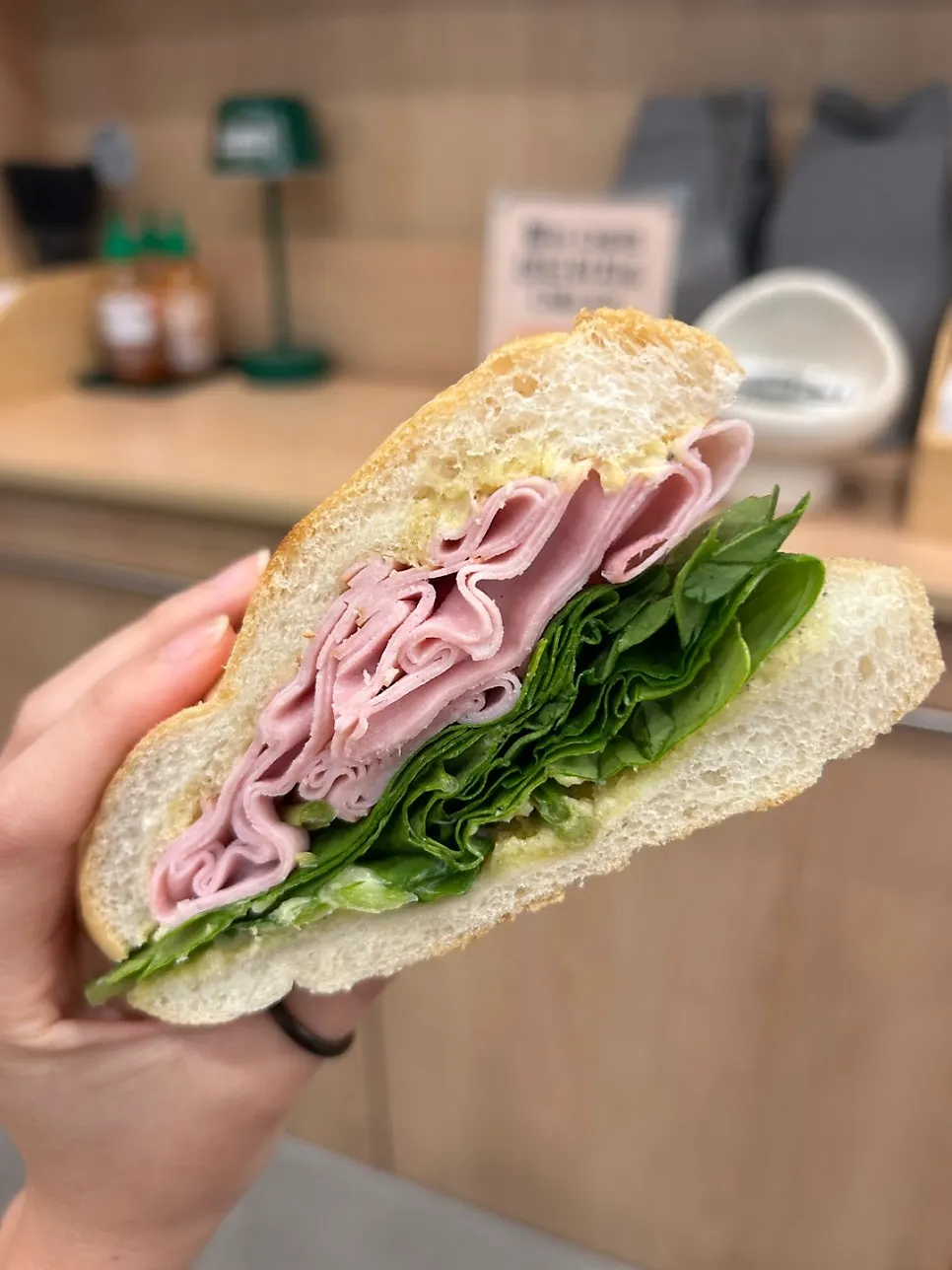 Cross-section of the truffle sandwich packed with jambon-beurre and lettuce
