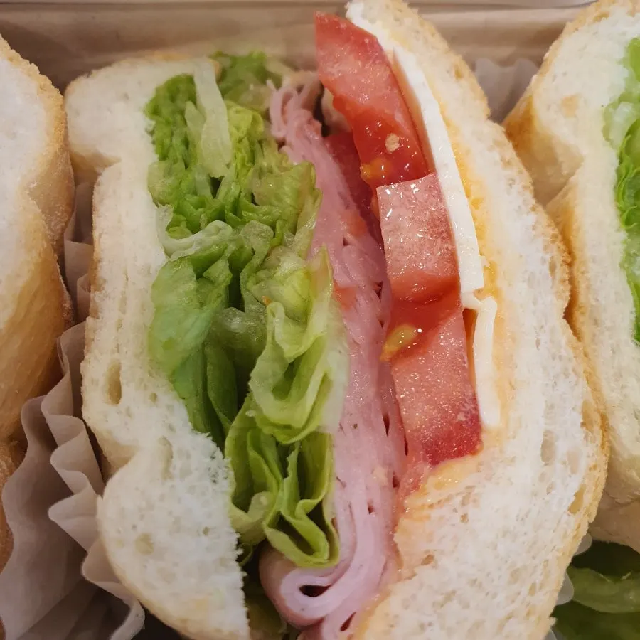 Town Sandwich with ham, cheese, and lettuce