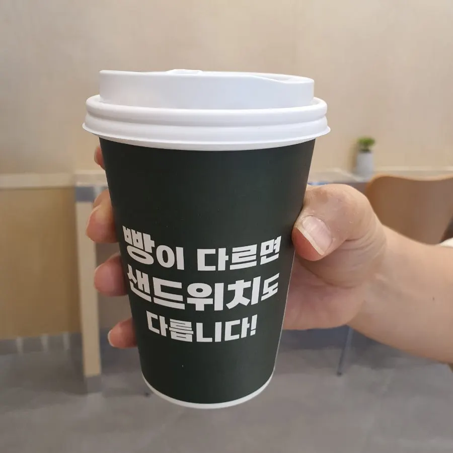 Hot americano served alongside the sandwiches