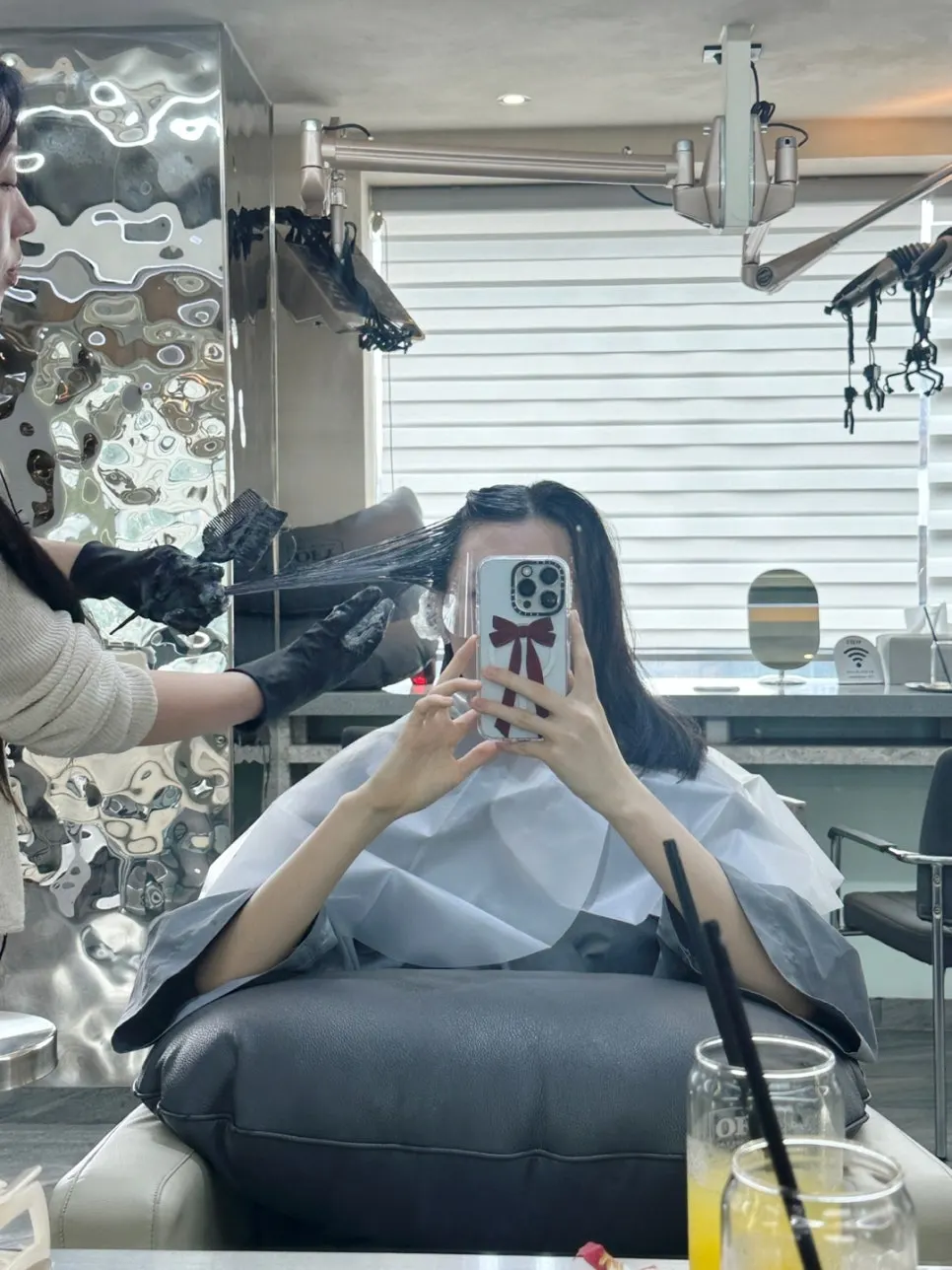 Applying black color to neutralize red tones