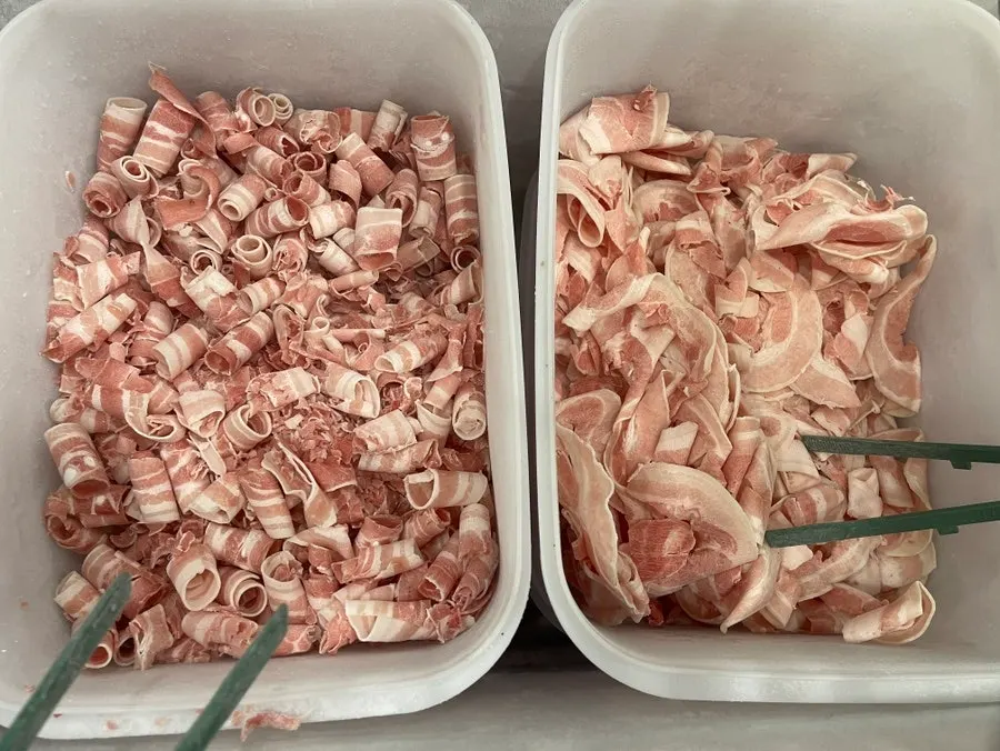 A plate with several varieties of shaved pork